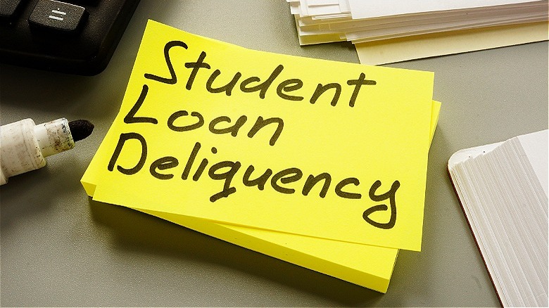 Sticky note "student loan delinquency" 