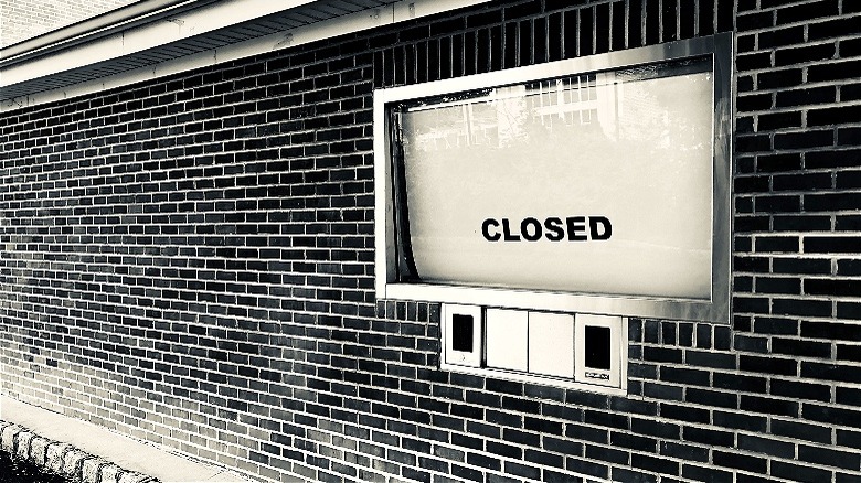 Bank drive-thru with "CLOSED" sign