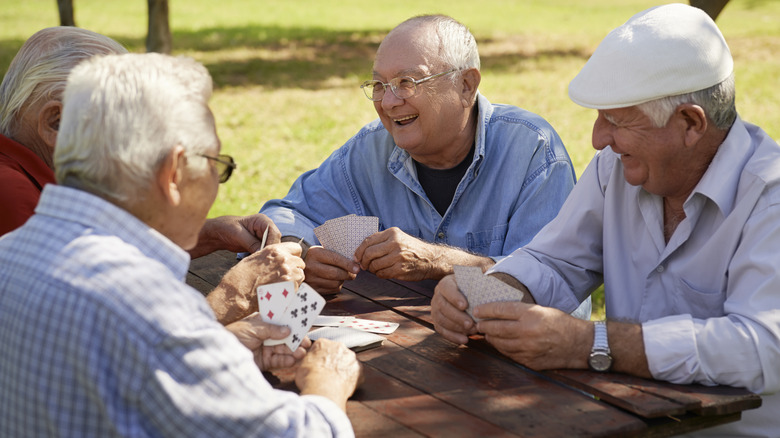 Old men play cards