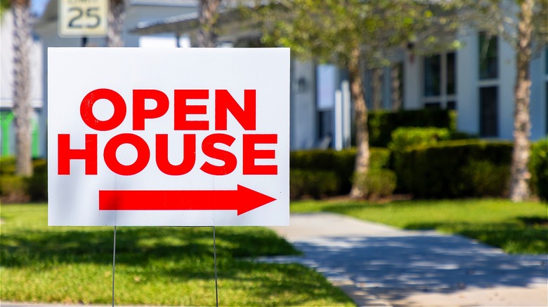 "OPEN HOUSE" sign outside home