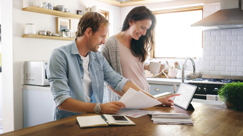 couple doing financial planning with documents