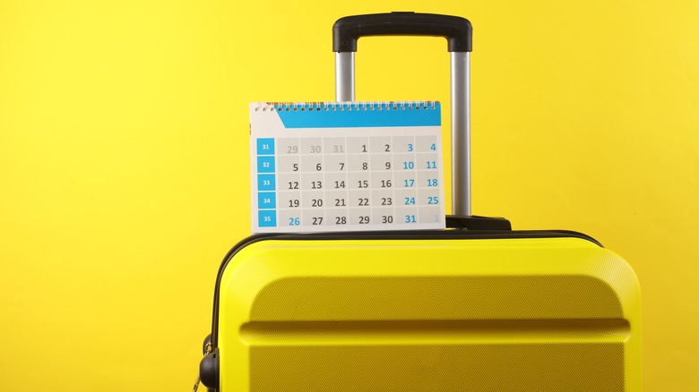 luggage with calendar on top