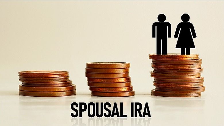 'Spousal IRA' beneath three coin stacks with a stick-figure couple atop the tallest one