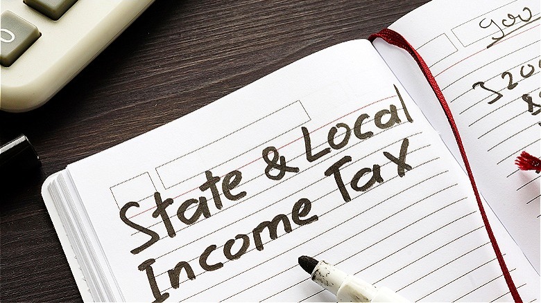 "State & Local Income Tax" written in notebook