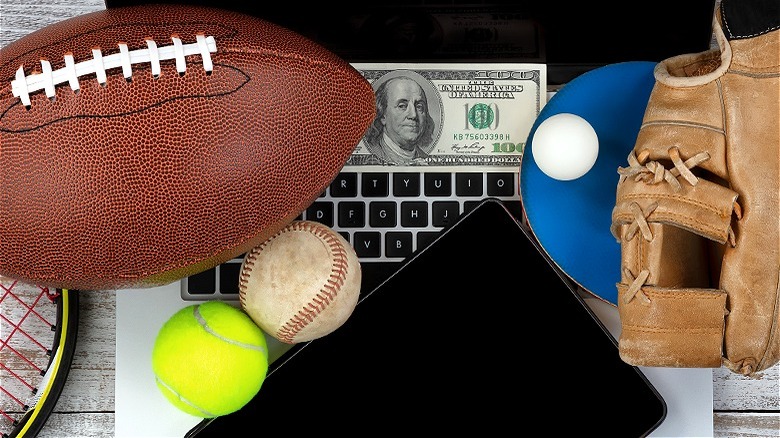 Laptop with different sports' balls