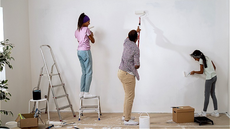 Father and daughters painting room