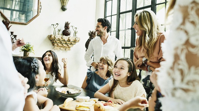 people from different generations around a table