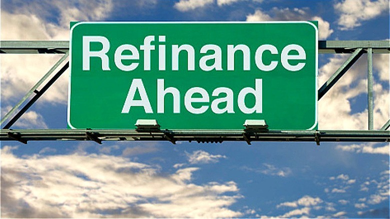 Refinance ahead road sign