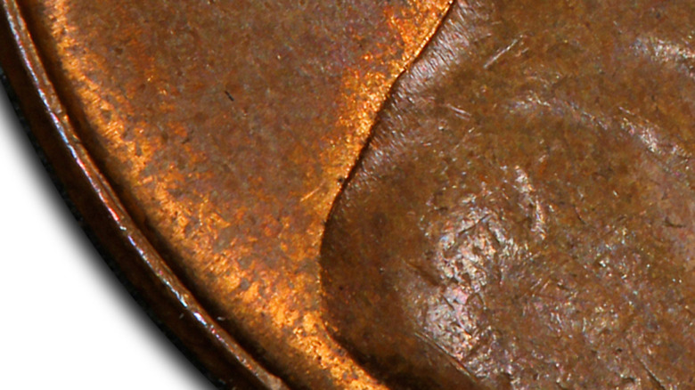 An extreme closeup of a doubled die Liberty on a penny.