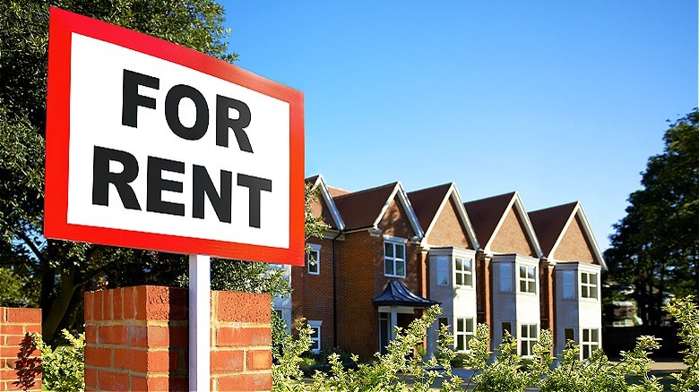 Semi-detached homes, "FOR RENT" sign