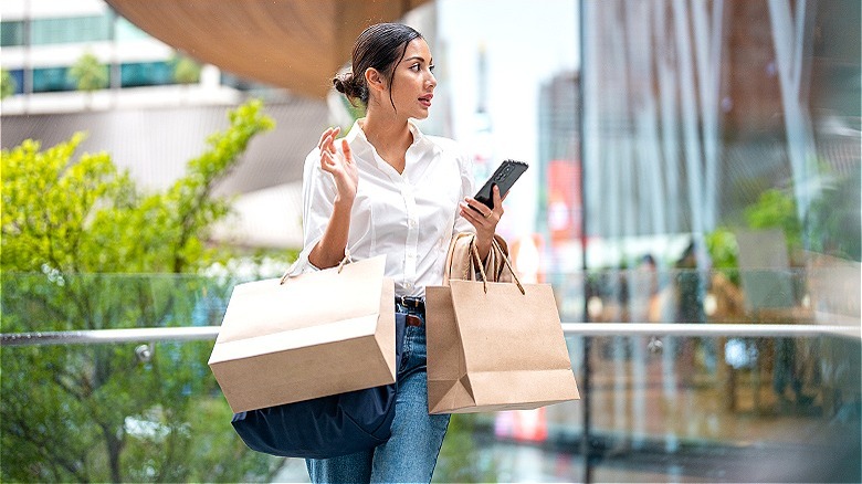 Person carrying shopping bags