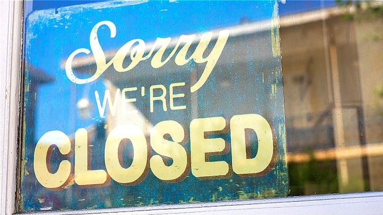 "Sorry We're Closed" store sign