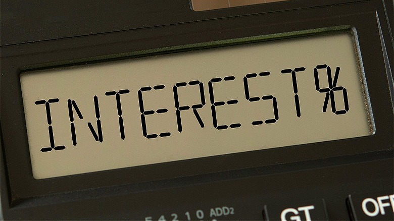 Calculator display with "INTEREST%"