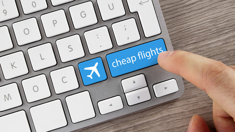 keyboard with cheap flights button