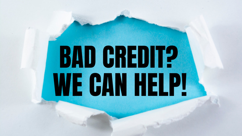 "Bad credit we can help" sign