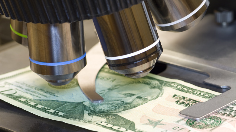 $50 bill under microscope