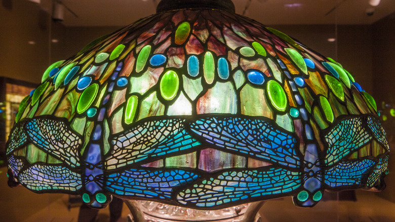 A real Tiffany lamp with dragonfly lampshade, on display.