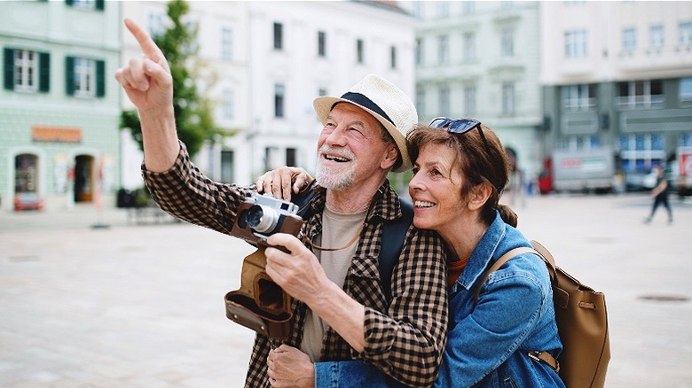 Older couple sightseeing during travels