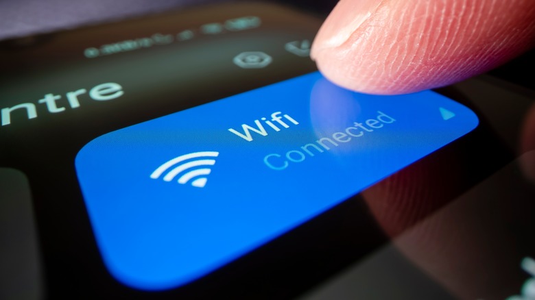 A women turning on wifi