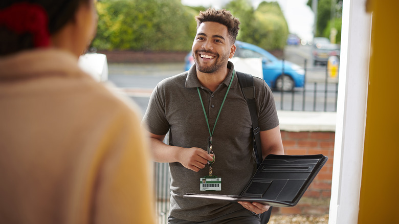 A door-to-door salesperson