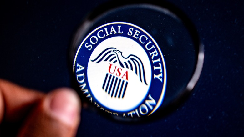 Thumb on Social Security logo