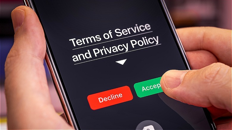 Person accepting mobile "Terms of Service" agreement