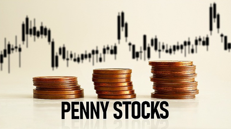 The word 'penny stocks' beneath coin stacks and a candlestick chart